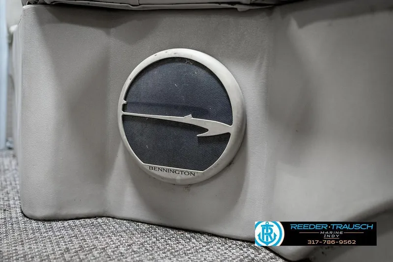 Slide: The Image of Speaker on a 2018 Bennington 20 SSRX boat, featuring Reeder-Trausch Marine branding. - 37