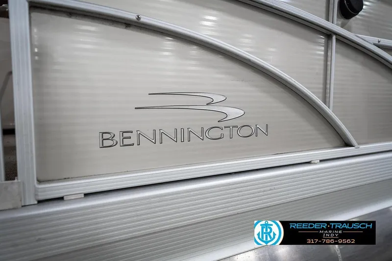 Slide: The Image of 2018 Bennington 20 SSRX pontoon boat with logo and Reeder-Trausch Marine contact details. - 44