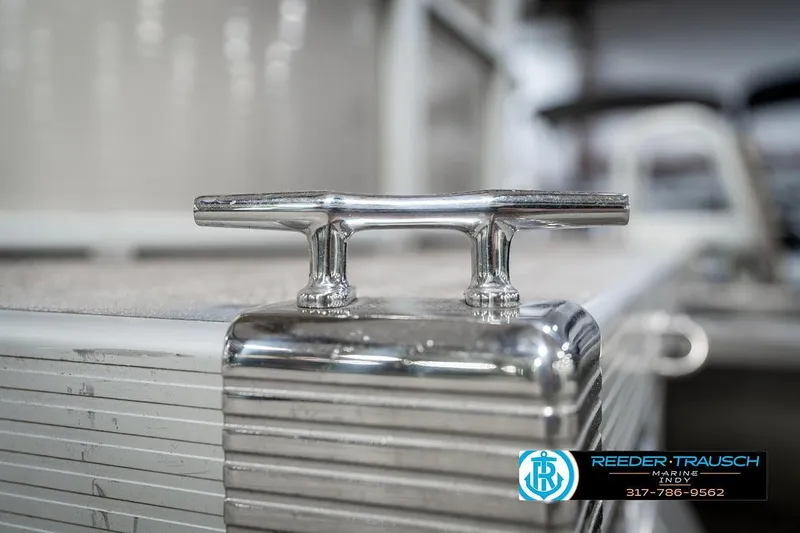 Slide: The Image of Chrome cleat on 2018 Bennington 20 SSRX boat deck, Reeder-Trausch Marine logo visible. - 46