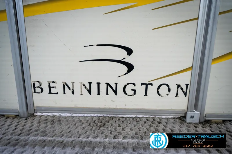 Slide: The Image of Bennington 2050 boat logo with Reeder-Trausch Marine contact details. - 21