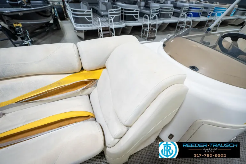 Slide: The Image of 2005 Bennington 2050 boat interior with damaged seating, displayed at Reeder Trausch Marine. - 40