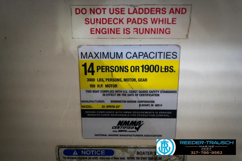 Slide: The Image of Bennington 2050 boat capacity label, 14 persons or 1900 lbs, 150 HP motor, 2005 model. - 46