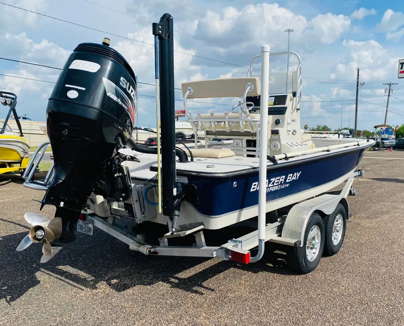 Slide: The Image of 2014 Blazer Bay 2200 Professional boat with Suzuki outboard motor on trailer. - 5