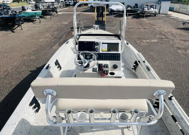 Slide: The Image of 2014 Blazer Bay 2200 Professional boat interior with steering console and seating. - 7