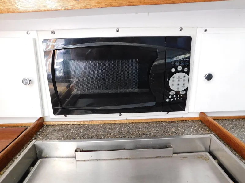 Slide: The Image of Islander 30 MK II - Galley Microwave - 4