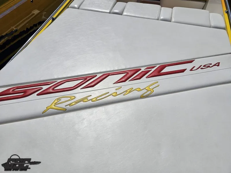 Slide: The Image of 2004 Sonic USA 45SS boat with racing logo on white upholstery. - 35