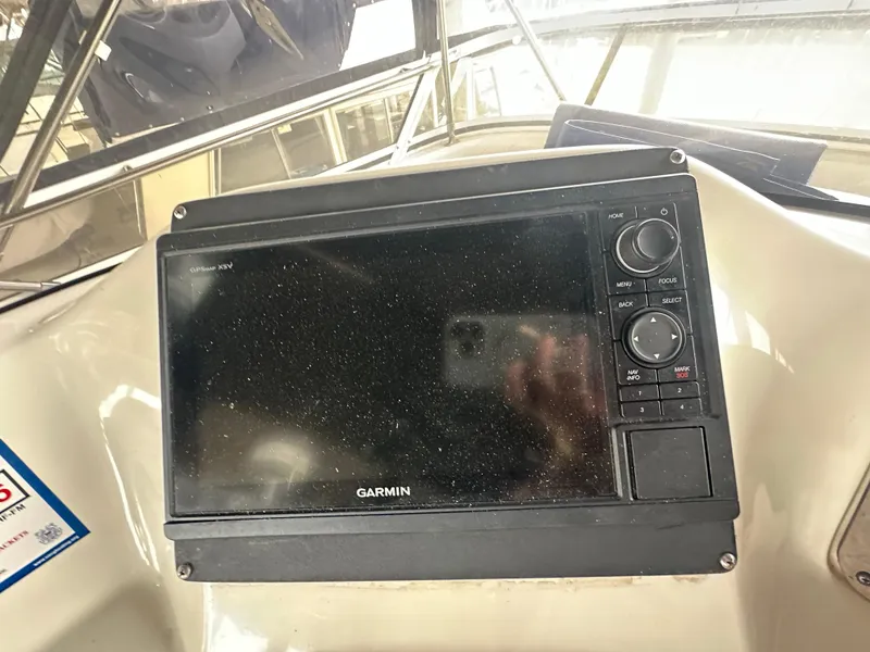 Slide: The Image of Garmin GPS display on 1996 Sea Ray 440 Express Bridge boat dashboard. - 20