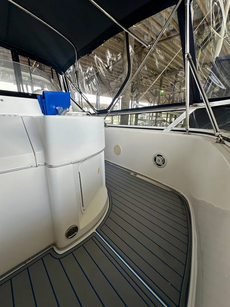 Slide: The Image of 1996 Sea Ray 440 Express Bridge interior with sleek design and modern features. - 23