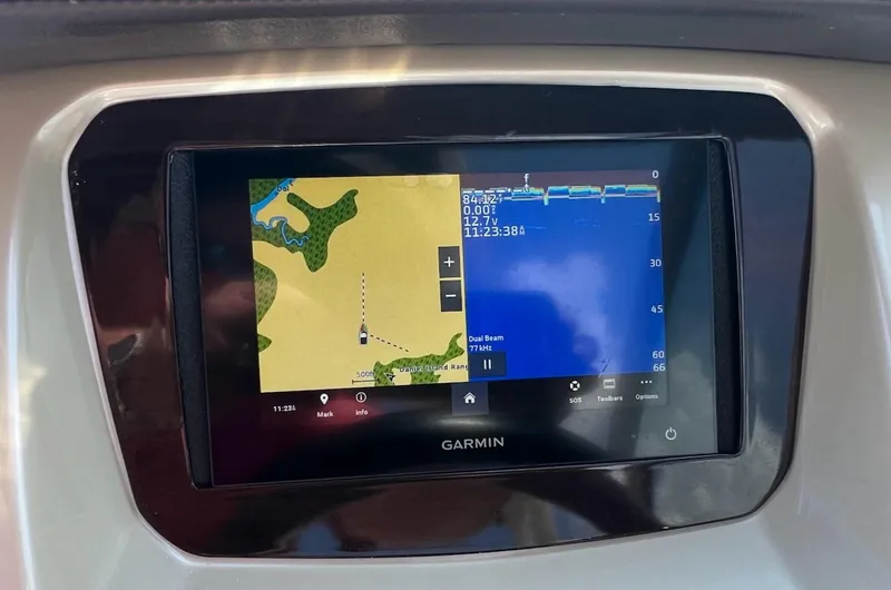 Slide: The Image of Garmin navigation display on 2017 Chaparral 244 Sunesta boat dashboard. - 6