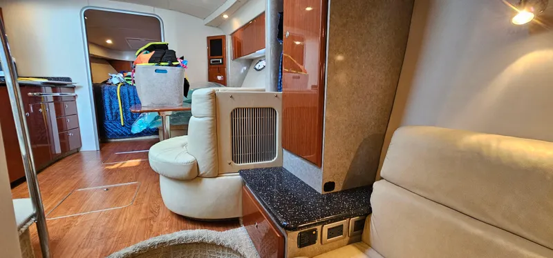 Slide: The Image of Interior of a 2007 Formula 37 Performance Cruiser with elegant wood furnishings and comfortable seating. - 54