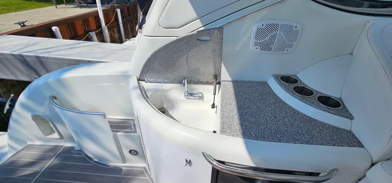 Slide: The Image of The image shows the cockpit of a 2007 Formula 37 Performance Cruiser with a small sink and cup holders. - 30