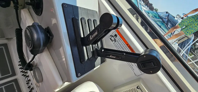 Slide: The Image of Close-up of the control console with switches and levers. - 23
