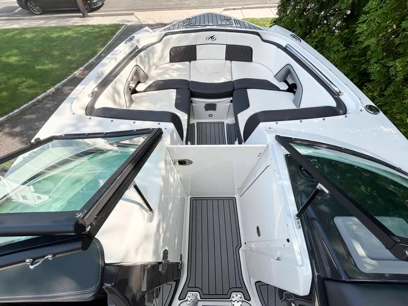Slide: The Image of 2020 Monterey M-45 boat with sleek seating and open deck design. - 11
