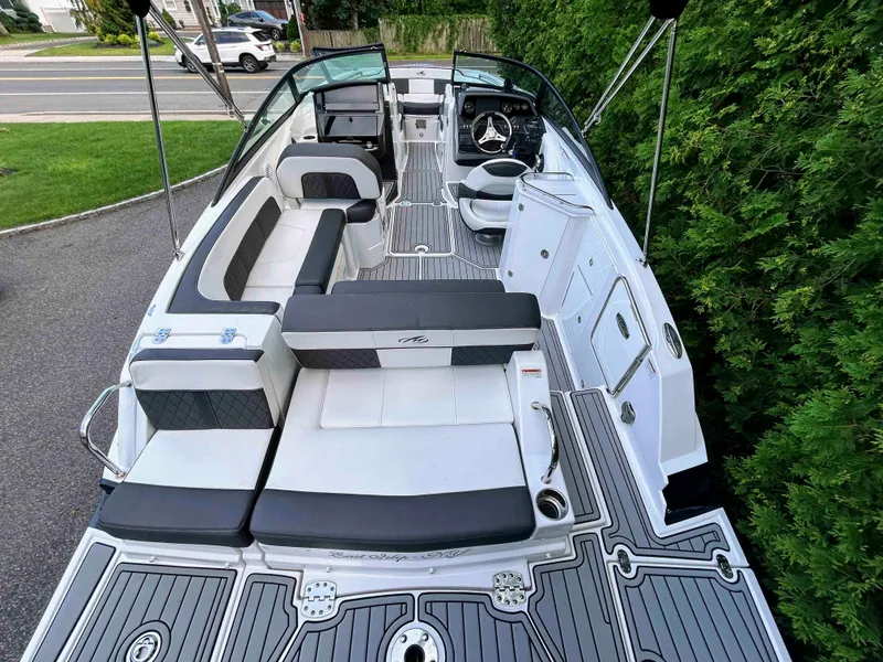 Slide: The Image of 2020 Monterey M-45 boat interior with sleek seating and modern dashboard design. - 3