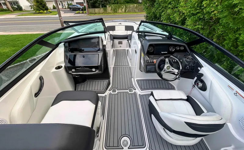 Slide: The Image of Interior of a 2020 Monterey M-45 boat with sleek seating and modern dashboard. - 4