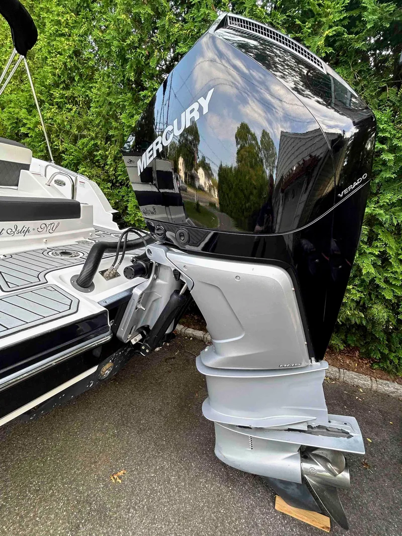 Slide: The Image of Outboard motor on a 2020 Monterey M-45 boat, featuring a Mercury Verado engine. - 6