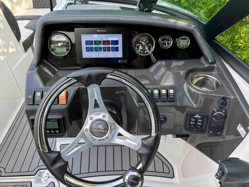Slide: The Image of Steering console of 2020 Monterey M-45 boat with digital display and controls. - 7