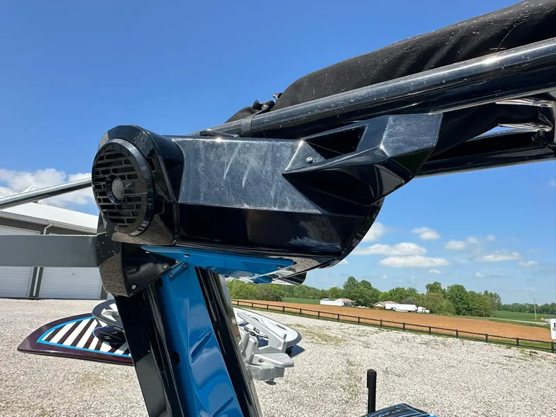 Slide: The Image of 2021 Centurion Fi25 boat tower with speaker, set against a clear blue sky. - 12