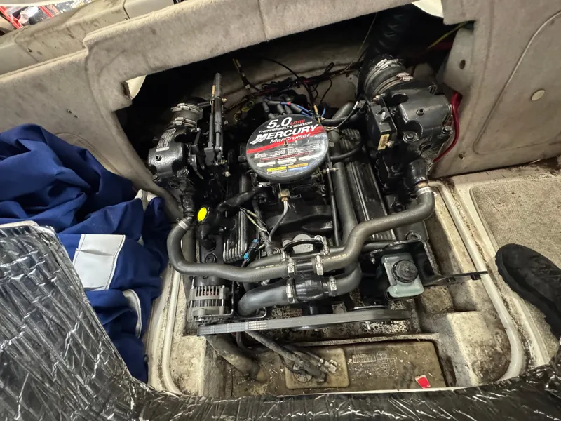 Slide: The Image of 2004 Maxum 2100 SC boat engine compartment with Mercury 5.0 liter engine. - 10