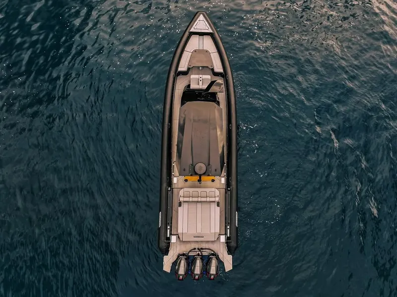 Slide: The Image of Top view of Skipper-BSK 42 boat on blue water, 2026 model. - 9
