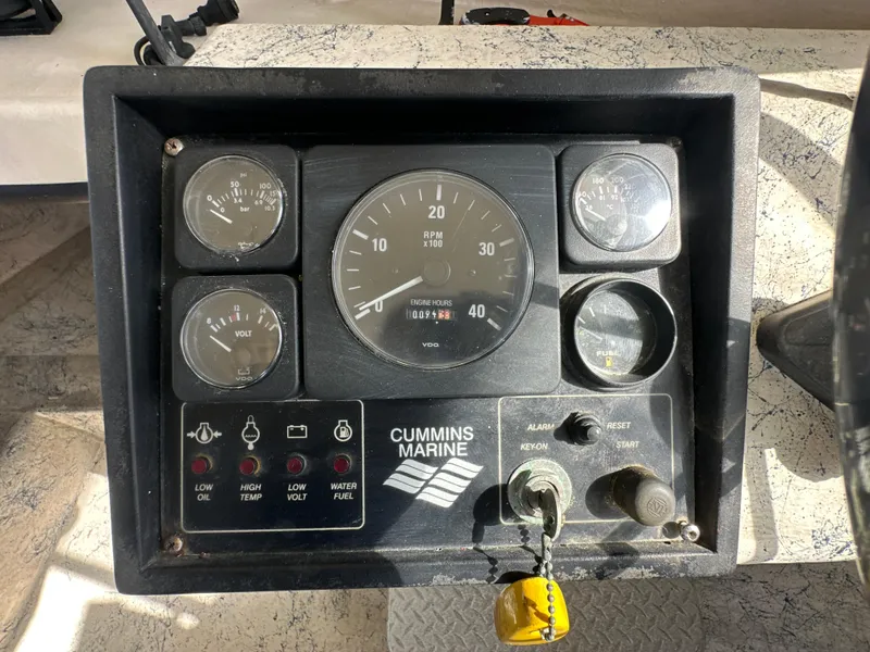 Slide: The Image of Control panel of a 2004 Jefferson Fiberglass 32 Laffite Skiff with Cummins Marine gauges. - 35