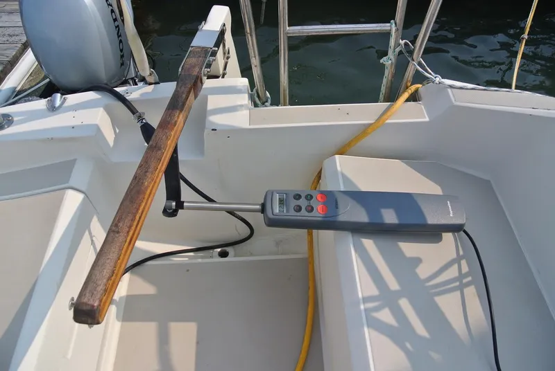 Slide: The Image of Cockpit of 1986 O'Day 272 sailboat with tiller and autopilot control. - 13