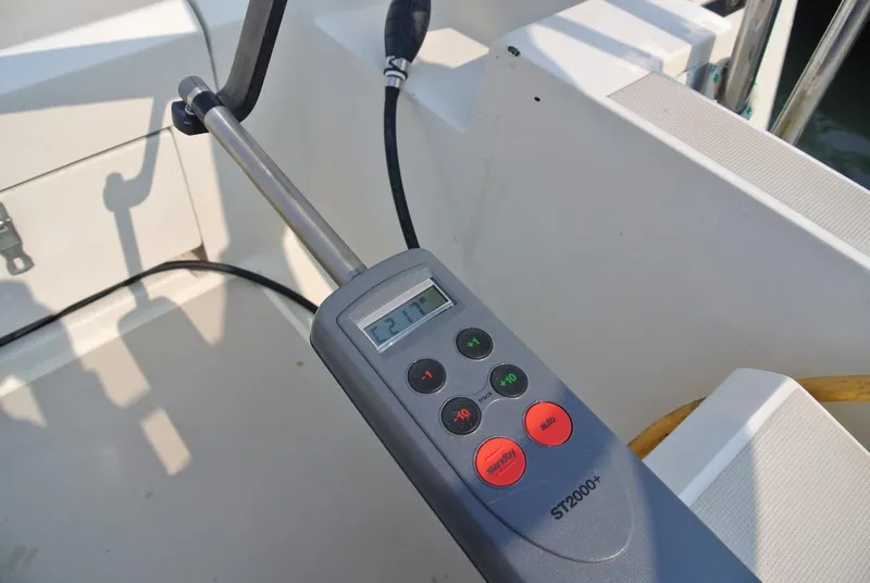 Slide: The Image of Autopilot control on 1986 O'Day 272 sailboat, displaying heading of 217 degrees. - 14