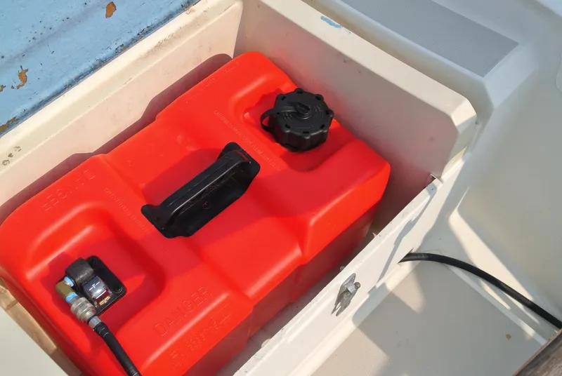 Slide: The Image of Red fuel tank in 1986 O'Day 272 sailboat compartment. - 17