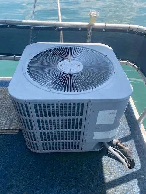 Slide: The Image of Outdoor air conditioning unit on a 1992 Jamestowner 16x72 houseboat deck. - 28