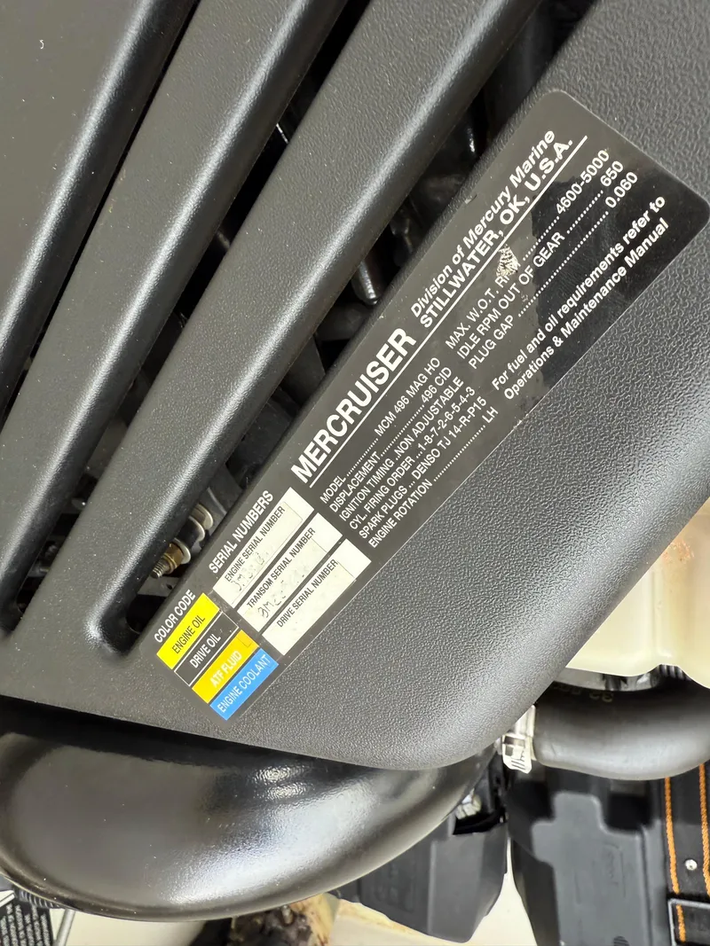 Slide: The Image of MerCruiser engine label on a 2003 Sunsation 288 boat, showing specifications and serial numbers. - 24