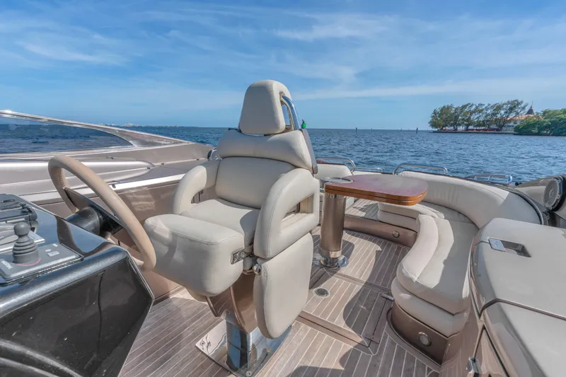 Slide: The Image of Luxurious 2005 Riva 44' Rivarama yacht interior with plush seating and ocean view. - 21