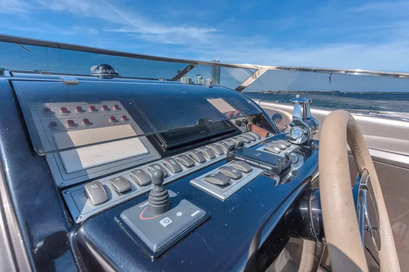 Slide: The Image of Control panel of a 2005 Riva 44' Rivarama yacht with ocean view. - 25