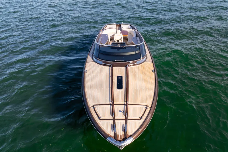 Slide: The Image of 2005 Riva 44' Rivarama luxury yacht on open water, top view. - 9