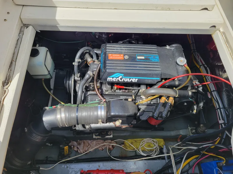 Slide: The Image of Engine compartment of a 1992 Sea Ray 330 Sundancer with MerCruiser engine. - 17