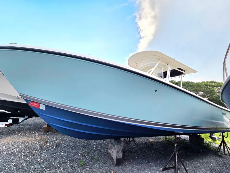 The Image of 2014 Pursuit C 280 Center Console boat for sale on stands. - 0