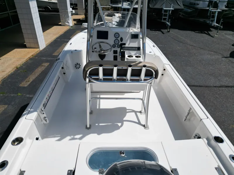 Slide: The Image of 2018 Tidewater 2110 Baymax boat interior with steering console and seating. - 10