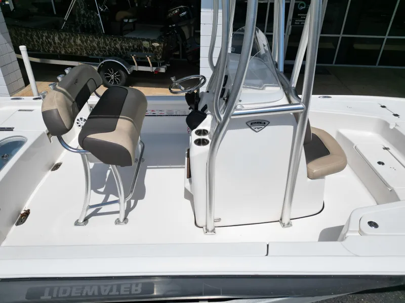 Slide: The Image of 2018 Tidewater 2110 Baymax boat interior with seating and console. - 11