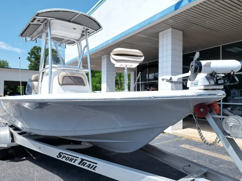 Slide: The Image of 2018 Tidewater 2110 Baymax boat on Sport Trail trailer outside dealership. - 15