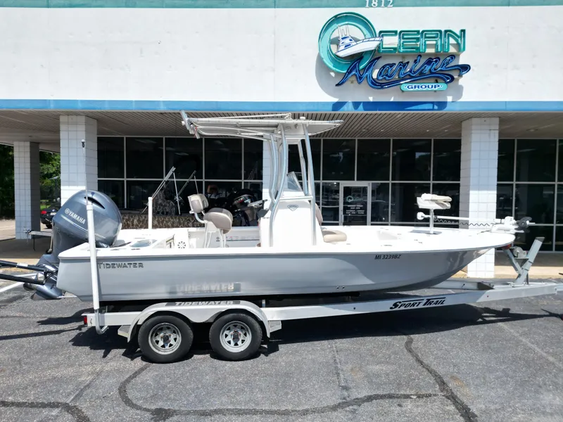 Slide: The Image of 2018 Tidewater 2110 Baymax boat on trailer outside Ocean Marine Group dealership. - 19