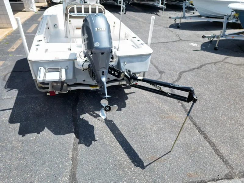 Slide: The Image of 2018 Tidewater 2110 Baymax boat with Yamaha 150 engine, parked on asphalt. - 7