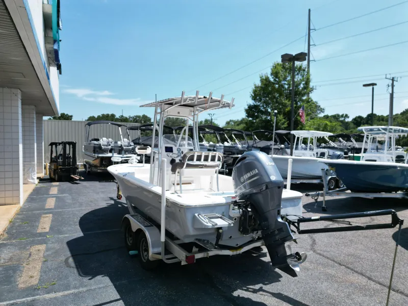 Slide: The Image of 2018 Tidewater 2110 Baymax boat with Yamaha engine in a dealership lot. - 8