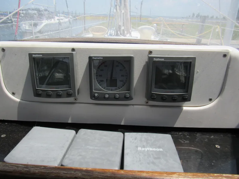 Slide: The Image of Control panel of a 2002 Hunter 466 sailboat with Raytheon instruments. - 20