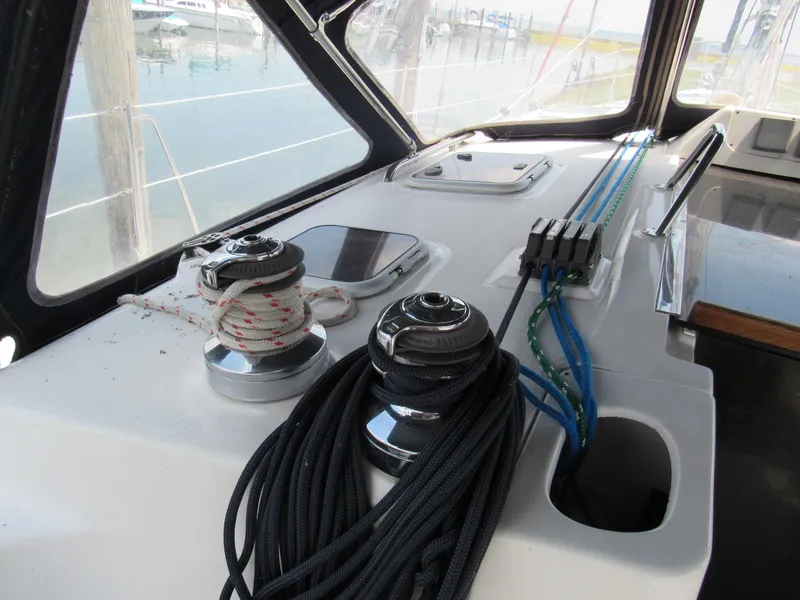 Slide: The Image of Sailboat deck with winches and ropes, Hunter 466, 2002 model, docked at marina. - 21