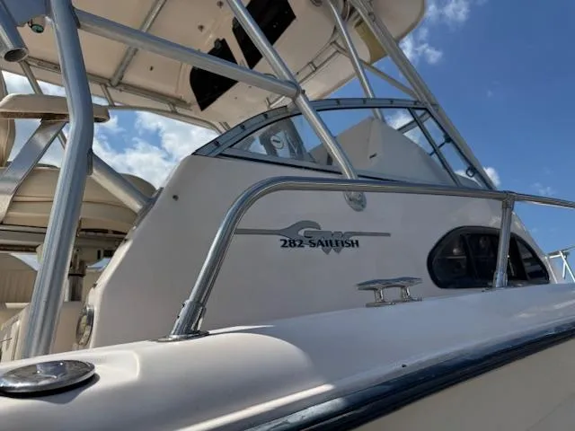 Slide: The Image of 2003 Grady-White Sailfish 282 boat, close-up view, showcasing sleek design and sturdy structure. - 6