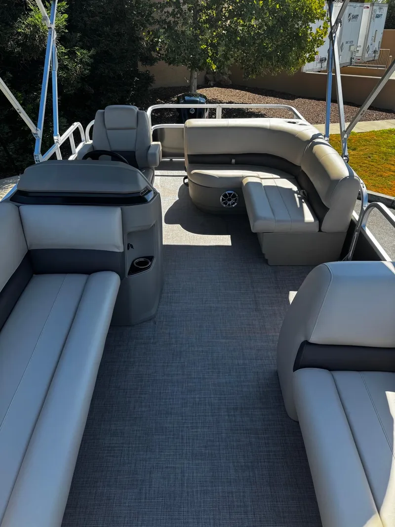 Slide: The Image of 2025 Sun Tracker Party Barge 18 DLX interior with spacious seating and modern design. - 5