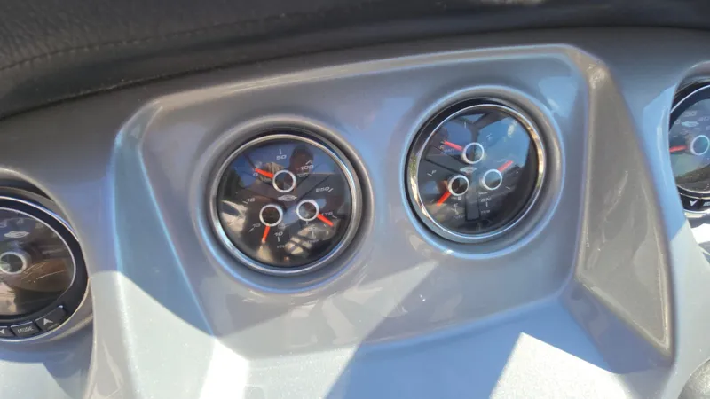 Slide: The Image of Dashboard gauges of a 2018 Chaparral 224 Sunesta boat. - 24
