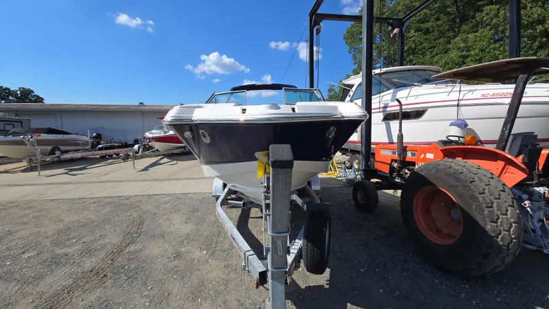 Slide: The Image of 2018 Chaparral 224 Sunesta boat on trailer in outdoor storage area. - 3