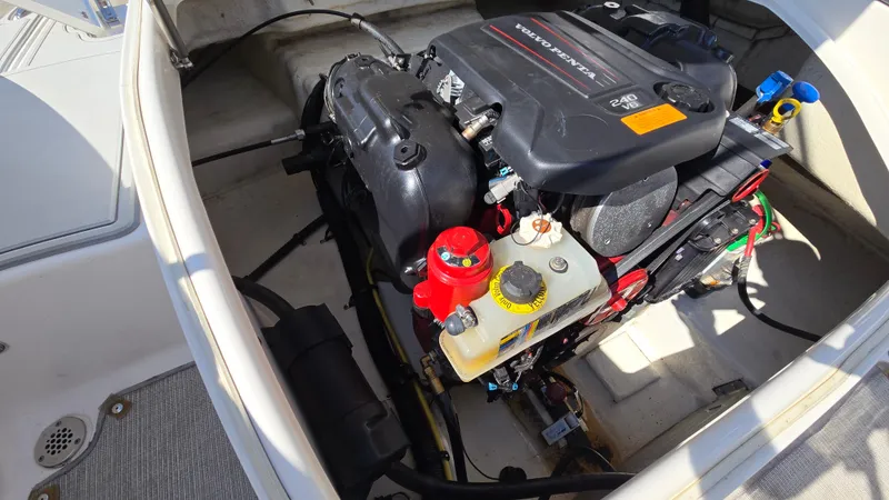 Slide: The Image of Engine compartment of 2018 Chaparral 224 Sunesta with Volvo Penta 240 V6 engine. - 30