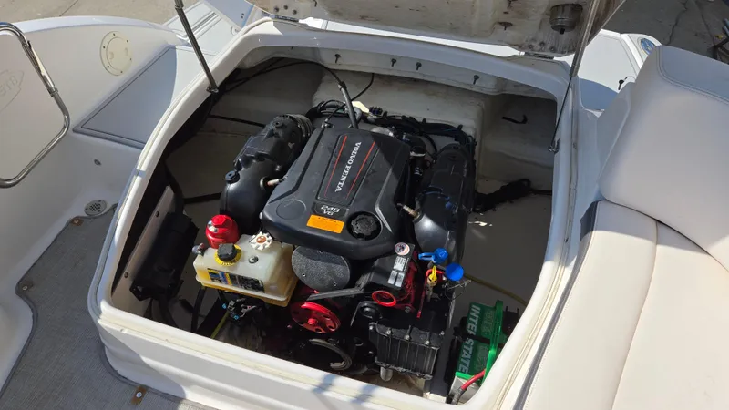 Slide: The Image of 2018 Chaparral 224 Sunesta boat engine compartment with Volvo Penta engine. - 31