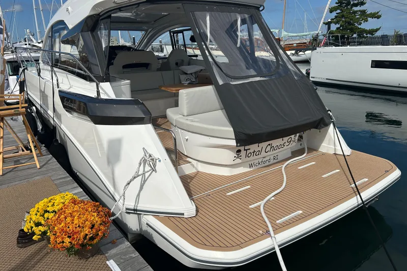 Slide: The Image of 2023 Beneteau Gran Turismo 41 yacht docked, featuring sleek design and spacious deck. - 15